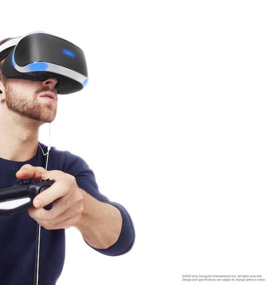 man wearing VR silver black glasses
